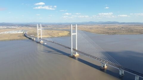 Aerial view of the cable-stayed New Yalu River Bridge linking Dandong in China with Sinuiju in North Korea