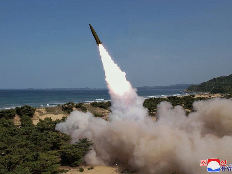 A North Korean missile lifting off from a coastal launch site in an image released by state media