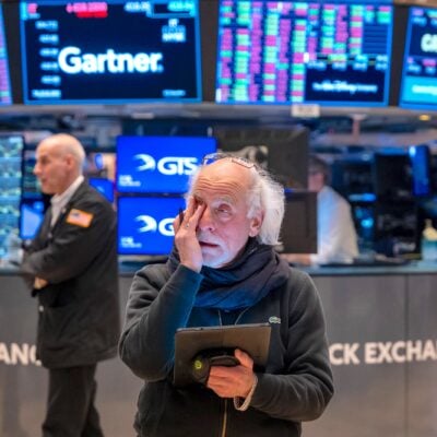 Traders on the floor of the New York Stock Exchange in a file photo as a global tech selloff nears Wall Street's open