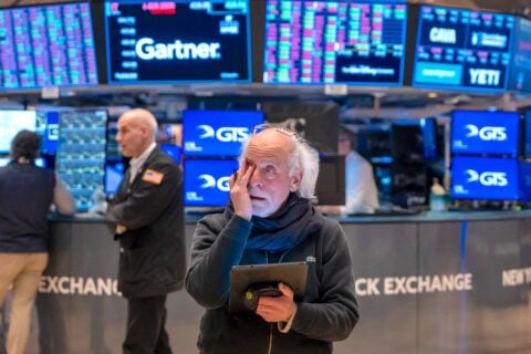 Traders on the floor of the New York Stock Exchange in a file photo as a global tech selloff nears Wall Street's open