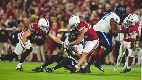 Lead photograph accompanying Oklahoma Athletics’ recap of Kentucky’s 21–13 win over Oklahoma.