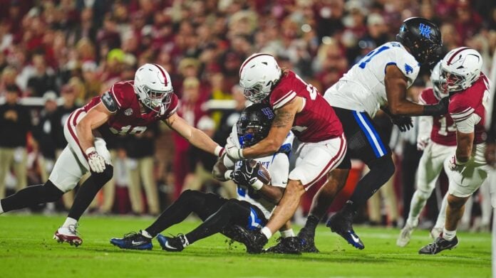 Lead photograph accompanying Oklahoma Athletics’ recap of Kentucky’s 21–13 win over Oklahoma.