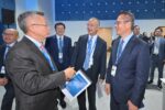 Hong Kong Financial Secretary Paul Chan laughing with HKMA chief Eddie Yue and IMF Deputy Managing Director Bo Li at the IMF-World Bank annual meetings in Bangkok