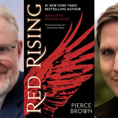Francis Lawrence and Justin Rhodes on either side of the cover of Pierce Brown's novel Red Rising