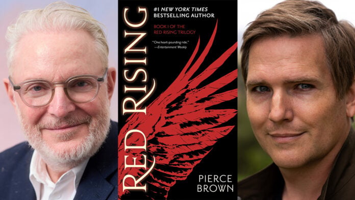 Francis Lawrence and Justin Rhodes on either side of the cover of Pierce Brown's novel Red Rising