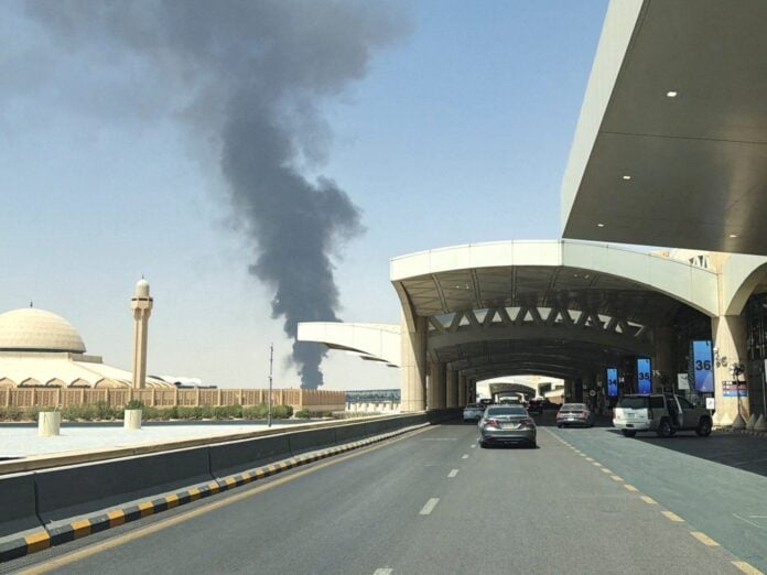 Riyadh King Khalid International Airport attack Houthis 12 killed October 2026