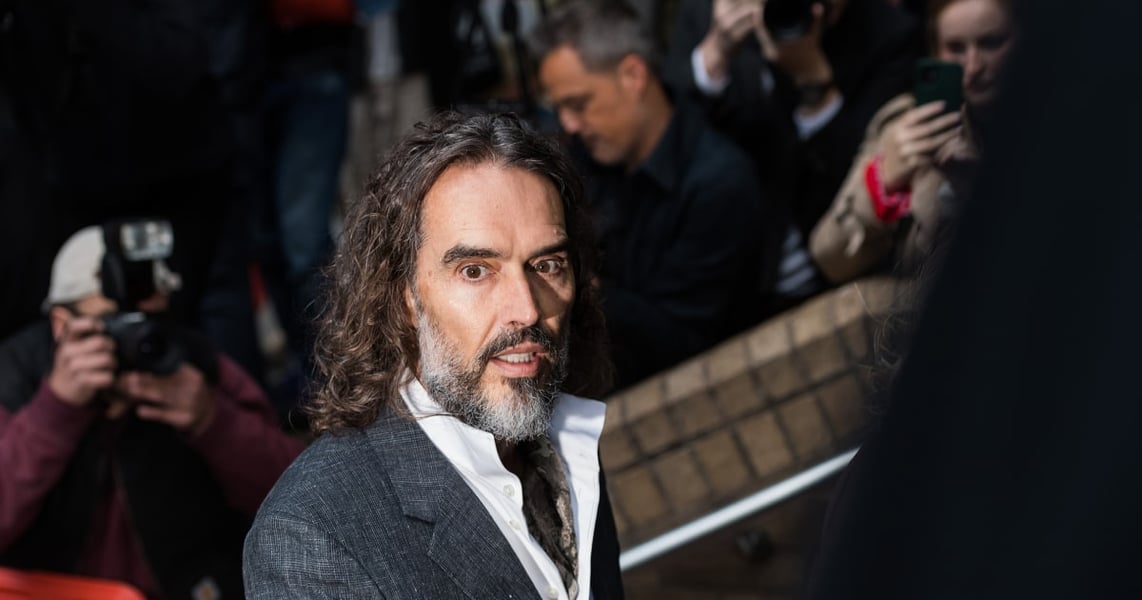Russell Brand walking into Southwark Crown Court on the first day of his trial in London
