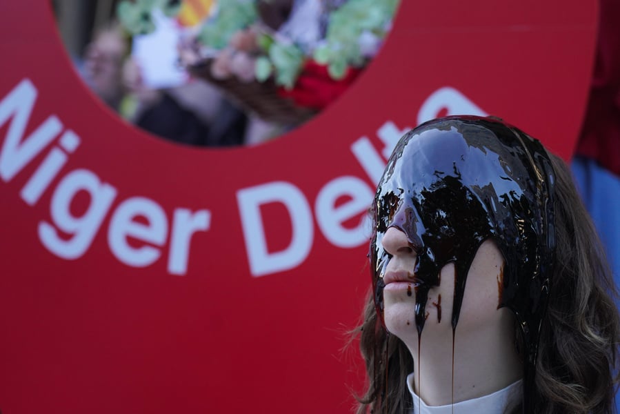 Campaigners stage a theatrical protest outside Shell's headquarters in London