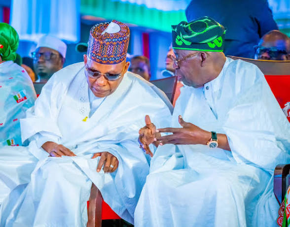 Vice President Kashim Shettima and President Bola Tinubu in conversation at the APC campaign council inauguration in Abuja