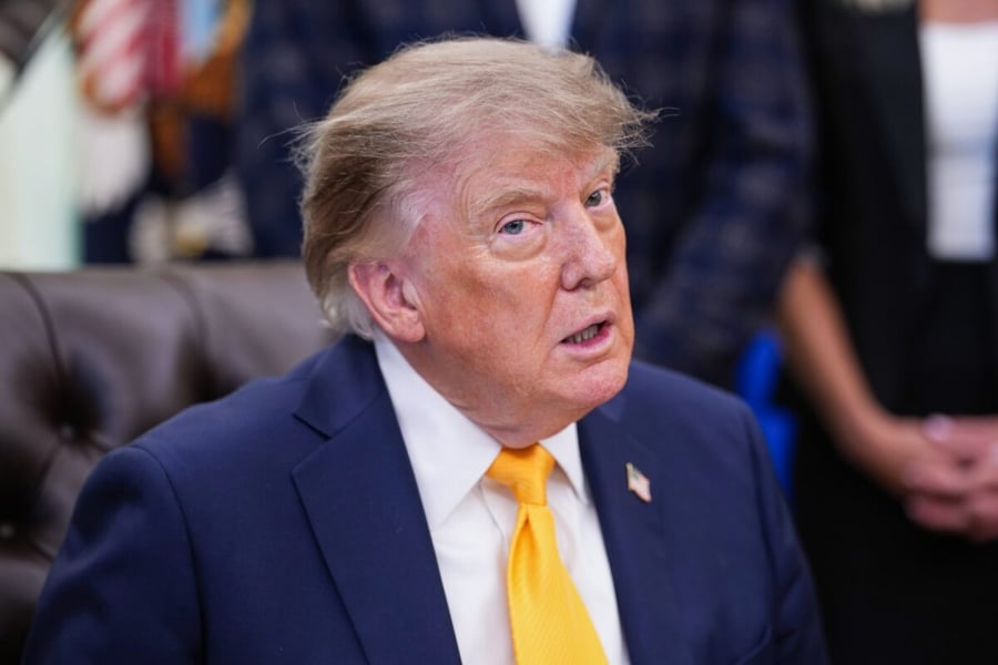 President Donald Trump speaking to reporters in the Oval Office