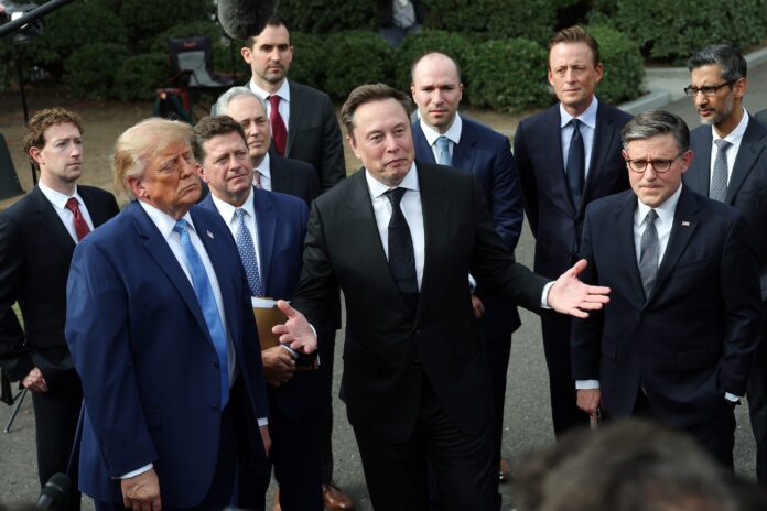 President Donald Trump stands with technology executives including Elon Musk and House Speaker Mike Johnson outside the White House