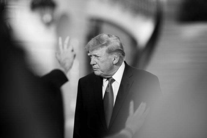 President Donald Trump in a black-and-white photograph taken as he left the White House for a trip to Youngstown, Ohio
