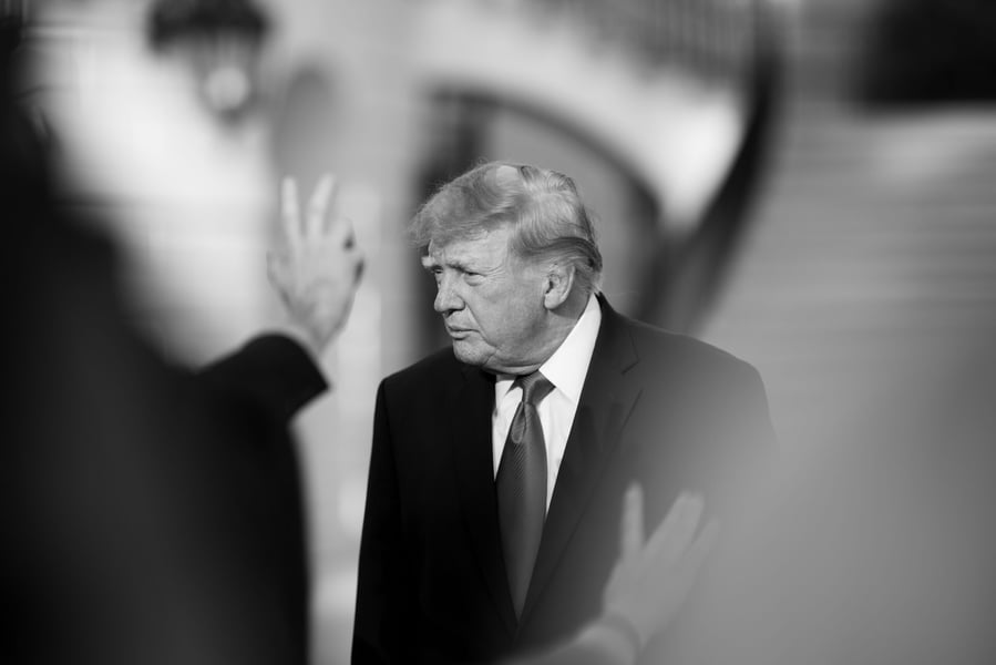 President Donald Trump in a black-and-white photograph taken as he left the White House for a trip to Youngstown, Ohio