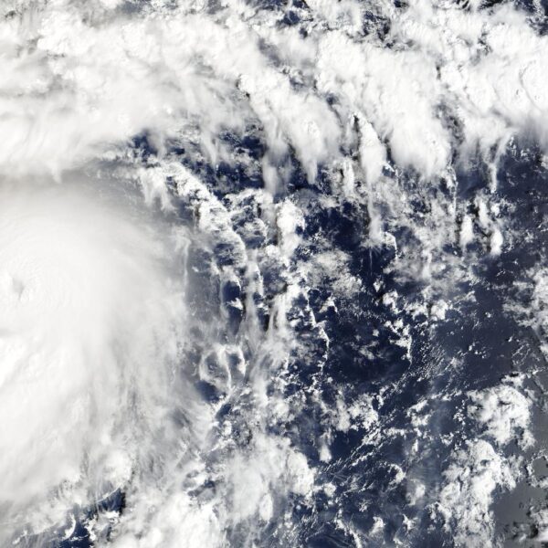 Satellite view of Typhoon Champi with a spiral cloud shield and a small eye, east-southeast of the Mariana Islands