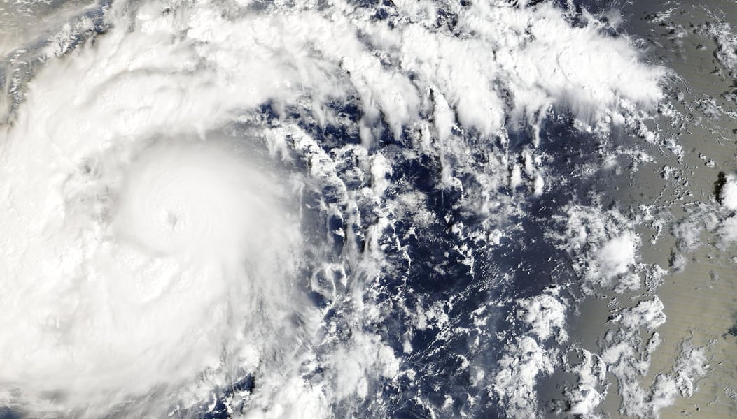 Satellite view of Typhoon Champi with a spiral cloud shield and a small eye, east-southeast of the Mariana Islands