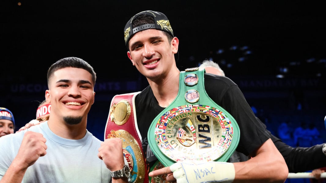 Xander Zayas and Sebastian Fundora posing together in the ring in a file photo, Fundora holding a WBC championship belt