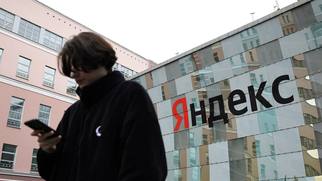 A man walks past the Moscow office of Russian technology company Yandex