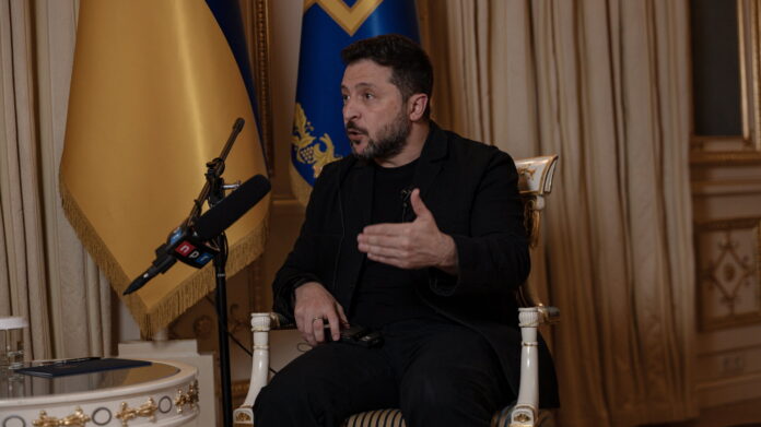 Ukrainian President Volodymyr Zelenskyy gestures during an interview with NPR in Kyiv